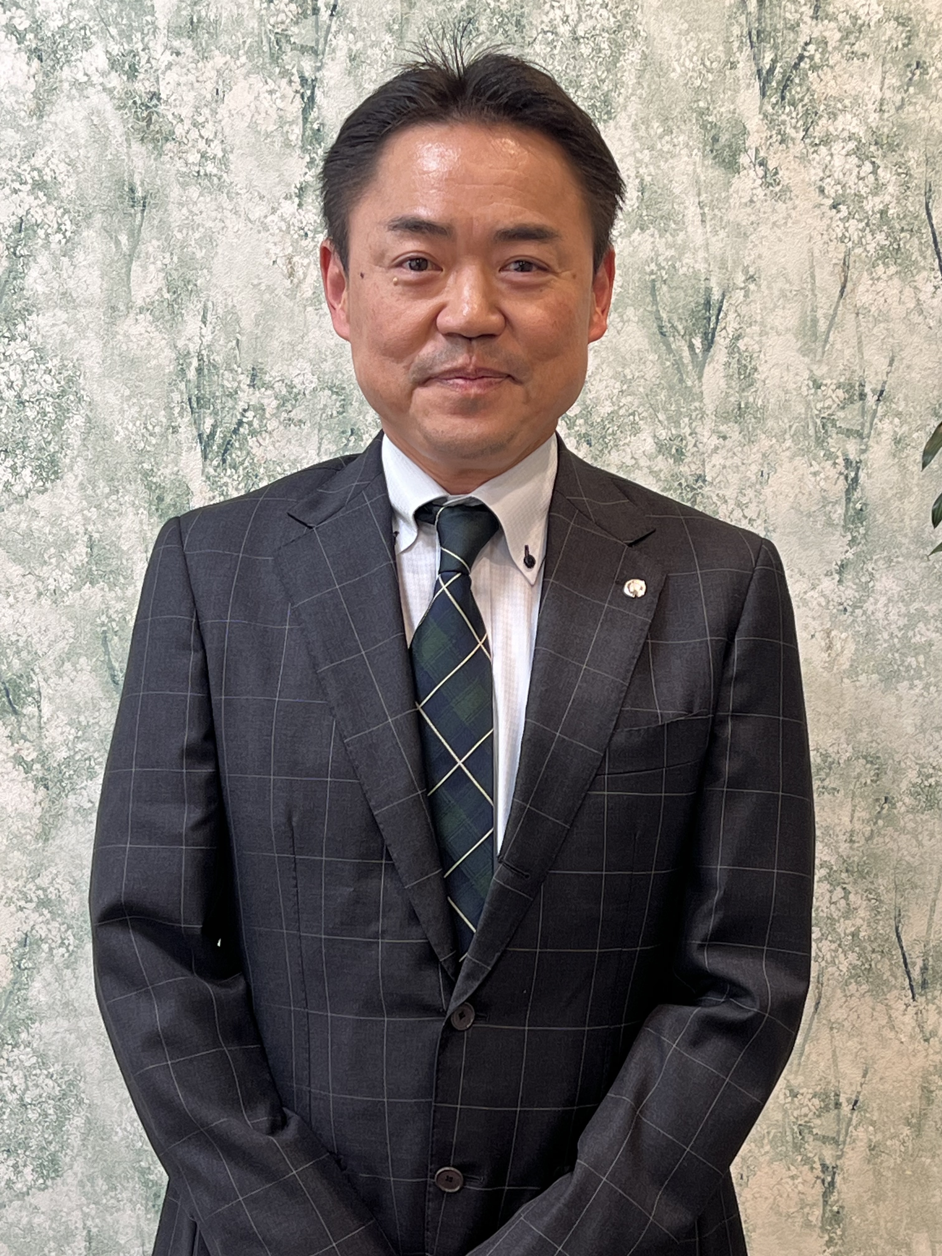 担当者