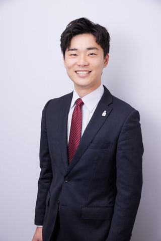 担当者