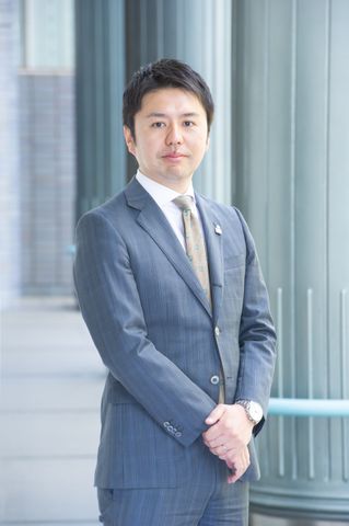 担当者