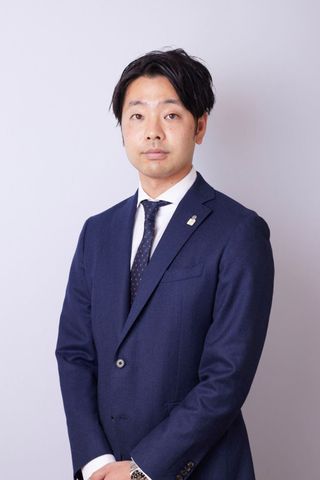 担当者